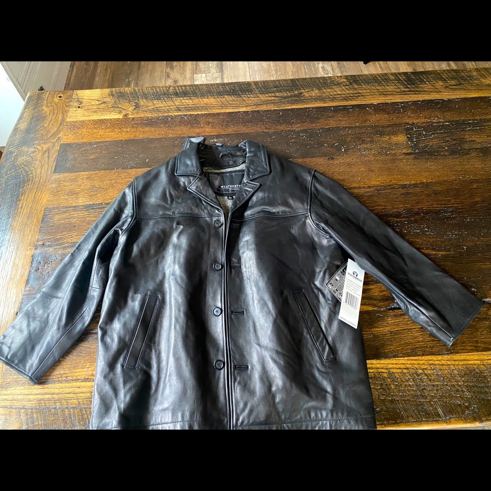 Mens size L leather coat. Never worn.
